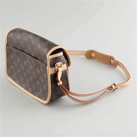 brown black crossbody louis vuitton bag|louis vuitton black shoulder bag.